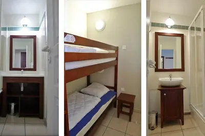 Un ou plusieurs lits dans un hébergement de l'établissement Résidence de vacances Domaine de Gascogne,grand appt 6 personnes 42m2