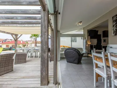 Coin salon dans l'établissement Holiday Home Les Baïnes by Interhome