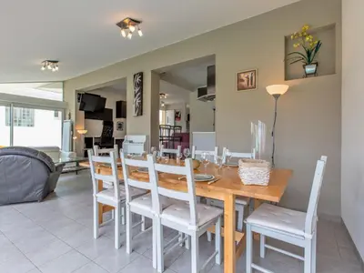 Coin salon dans l'établissement Holiday Home Les Baïnes by Interhome