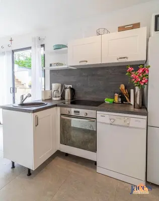 Cuisine ou kitchenette dans l'établissement Villa Paradis