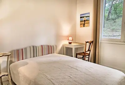 Un ou plusieurs lits dans un hébergement de l'établissement Villa Le Menez Avec Vue Sur Le Lac Marin Pour 10 Personnes