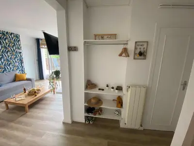 Télévision ou salle de divertissement dans l'établissement Appartement Pour 6 Personne- Residence San Michele
