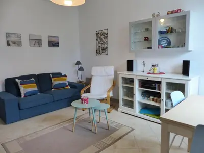 Coin salon dans l'établissement Villa Mitoyenne Pour 4 Personnes Proche Centre-Ville D hossegor