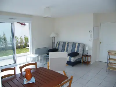 Coin salon dans l'établissement Appartement Rez-De-Chaussee 4 Personnes Face Au Port De Peche- Residence Le Magellan