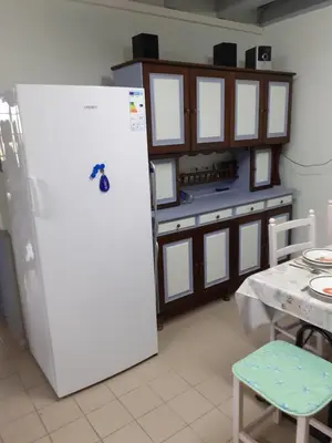 Cuisine ou kitchenette dans l'établissement LE Gîte DE LA GRANGE DE BROUSTIC