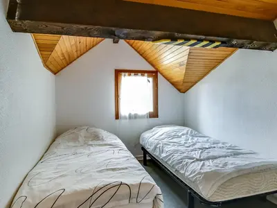 Un ou plusieurs lits dans un hébergement de l'établissement Biscarrosse Plage, maison T3 avec jardin, animaux admis, à 400m de la mer! - FR-1-521-107