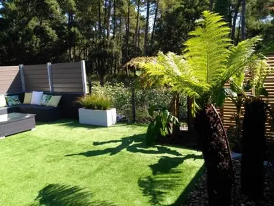 Jardin de l'établissement Villa patio terrasse privative océan 10 min a pied