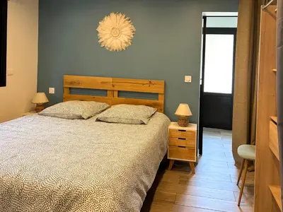 Un ou plusieurs lits dans un hébergement de l'établissement Villa patio terrasse privative océan 10 min a pied