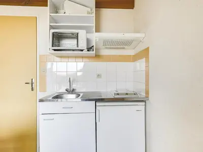 Cuisine ou kitchenette dans l'établissement Studio mezzanine à 300m de la plage avec parking - FR-1-521-48