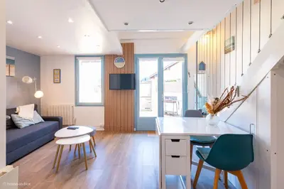 Coin salon dans l'établissement Les Cottages - Maison 4 à 5 personnes au bord de l'océan