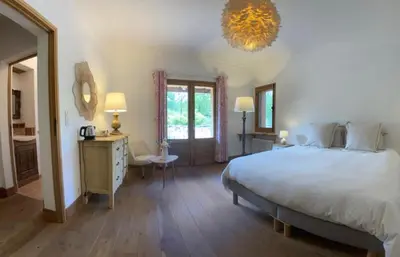 Un ou plusieurs lits dans un hébergement de l'établissement Chambres d'hôtes à Pontonx