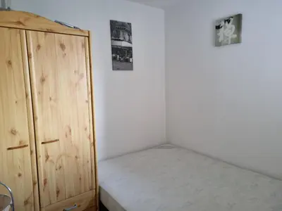 Un ou plusieurs lits dans un hébergement de l'établissement Appartement T2 - 3 pers - à 400m de la plage, centre station, avec loggia - Biscarrosse Plage - FR-1-521-120