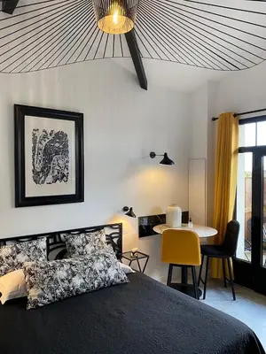 Un ou plusieurs lits dans un hébergement de l'établissement Hôtel particulier - Les lodges du Bassin d'Arcachon- Suites privées haut de gamme- Clim-Parking privé