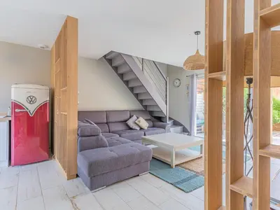 Coin salon dans l'établissement Maison Mitoyenne Près de l'Océan à Biscarrosse - 6 Couchages, Terrasse, Parking - FR-1-521-121