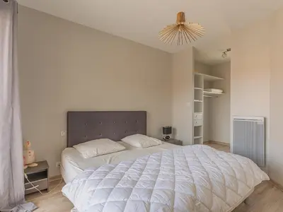 Un ou plusieurs lits dans un hébergement de l'établissement Maison Mitoyenne Près de l'Océan à Biscarrosse - 6 Couchages, Terrasse, Parking - FR-1-521-121
