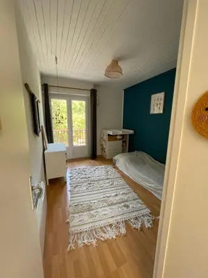 Un ou plusieurs lits dans un hébergement de l'établissement Appartement avec jardin entre lac et océan Hossegor