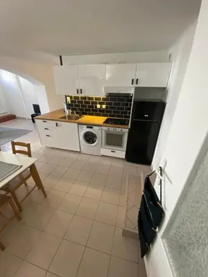 Cuisine ou kitchenette dans l'établissement Le petit coin plage