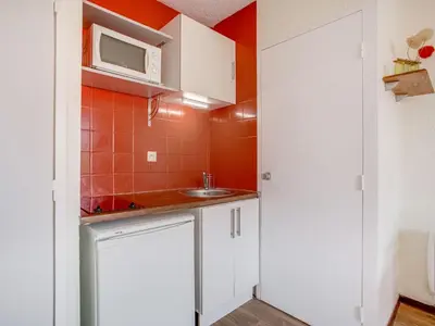 Cuisine ou kitchenette dans l'établissement Studio La Dune-6 by Interhome