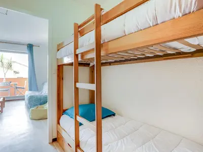 Un ou plusieurs lits dans un hébergement de l'établissement Studio La Dune-6 by Interhome