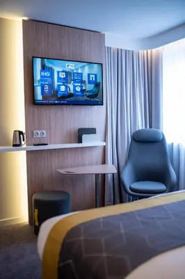Télévision ou salle de divertissement dans l'établissement Holiday Inn Express - Arcachon - La Teste by IHG