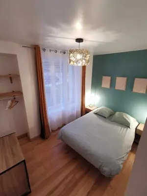 Un ou plusieurs lits dans un hébergement de l'établissement Les appartements du centre, refaits à neuf, climatisés, hyper centre, 50m à pieds des commerces, restaurants, parking gratuit