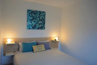 Un ou plusieurs lits dans un hébergement de l'établissement Villa Uhaïna Hossegor