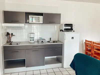 Cuisine ou kitchenette dans l'établissement Les Pastourelles