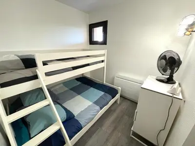Un ou plusieurs lits dans un hébergement de l'établissement T3 avec Terrasse et Parking, Ascenseur - Capbreton - FR-1-413-152