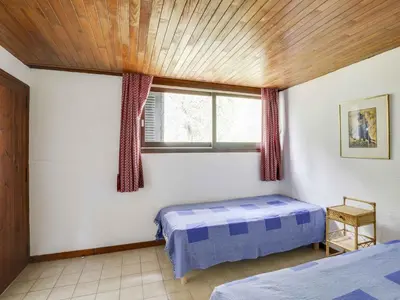 Un ou plusieurs lits dans un hébergement de l'établissement Maison atypique 7 pers, 2 terrasses, cheminée, à 1,5 km des plages et centre - FR-1-521-143