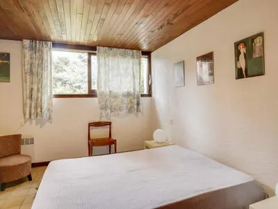 Un ou plusieurs lits dans un hébergement de l'établissement Maison atypique 7 pers, 2 terrasses, cheminée, à 1,5 km des plages et centre - FR-1-521-143
