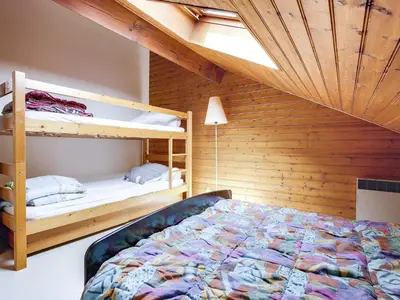 Un ou plusieurs lits dans un hébergement de l'établissement Appartement T3 duplex à 300m de la plage avec parking - FR-1-521-144