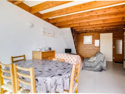 Un ou plusieurs lits dans un hébergement de l'établissement Appartement T3 duplex à 300m de la plage avec parking - FR-1-521-144