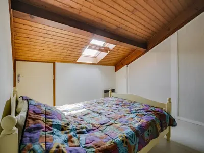 Un ou plusieurs lits dans un hébergement de l'établissement Appartement T3 duplex à 300m de la plage avec parking - FR-1-521-144