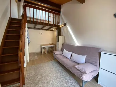 Coin salon dans l'établissement Maison Cosy à Capbreton: Proche Plage, Piscine Commune, Terrasse & Parking Sécurisé - FR-1-413-124