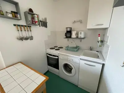 Cuisine ou kitchenette dans l'établissement Appartement à Hossegor, à 30m de la plage avec piscine et parking souterrain - FR-1-413-135