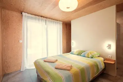 Un ou plusieurs lits dans un hébergement de l'établissement Villa 3 chambres Contis-plage à 900m de l océan