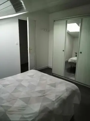Un ou plusieurs lits dans un hébergement de l'établissement CHEZ MARTINE Appt climatisé 1 Chambre