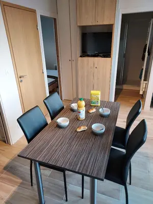 Télévision ou salle de divertissement dans l'établissement Appartement Mimizan Plage accès direct plage surveillée