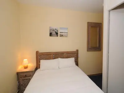 Un ou plusieurs lits dans un hébergement de l'établissement Hotel La Cabane