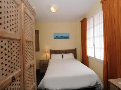 Un ou plusieurs lits dans un hébergement de l'établissement Hotel La Cabane