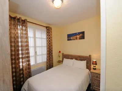 Un ou plusieurs lits dans un hébergement de l'établissement Hotel La Cabane