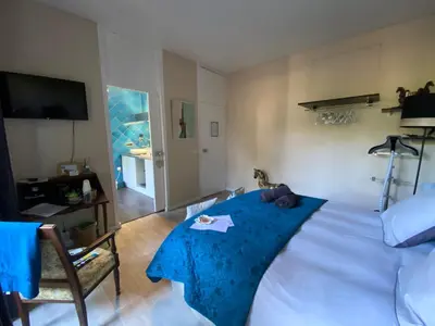 Télévision ou salle de divertissement dans l'établissement l'hacienda