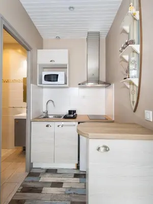 Cuisine ou kitchenette dans l'établissement Le Studio de Noreda
