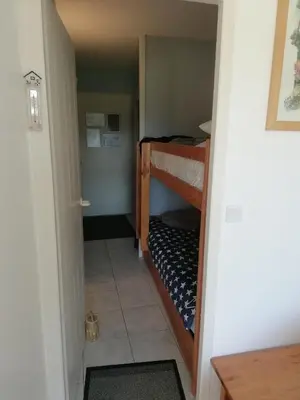 Un ou plusieurs lits dans un hébergement de l'établissement Appartement T2 cabine, capacité 4 personnes, à 600 m de la plage et à 300 m du Golf