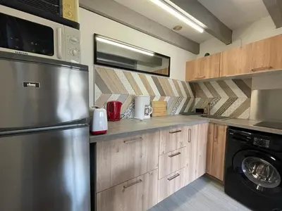 Cuisine ou kitchenette dans l'établissement Villa Patio à 20m de la plage avec terrasse et parking - FR-1-413-159
