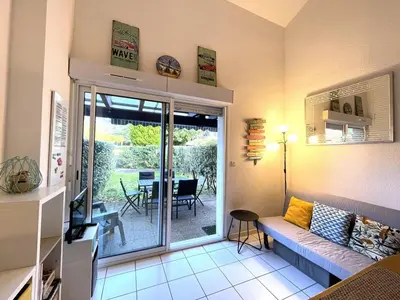 Coin salon dans l'établissement Appartement T2 mezzanine avec terrasse et animaux acceptés - FR-1-379-119
