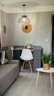 Coin salon dans l'établissement appartement en residence PIERRE ET VACANCE au golf
