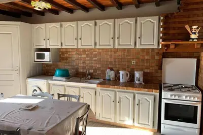 Cuisine ou kitchenette dans l'établissement Gîte au coeur de la ferme
