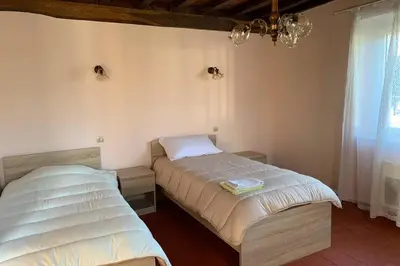 Un ou plusieurs lits dans un hébergement de l'établissement Gîte au coeur de la ferme