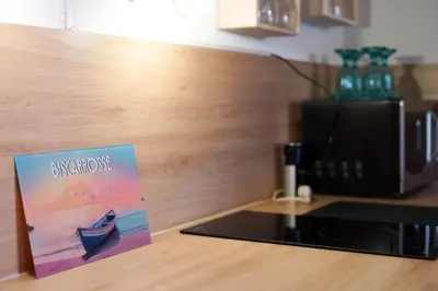 Cuisine ou kitchenette dans l'établissement Maisonnette à 50m de la plage